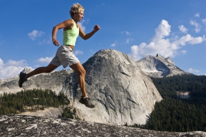 Woman Trail Runner Bounding